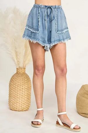 Frayed TENCEL Drawstring Beach Shorts in Light Denim women outfit ideas