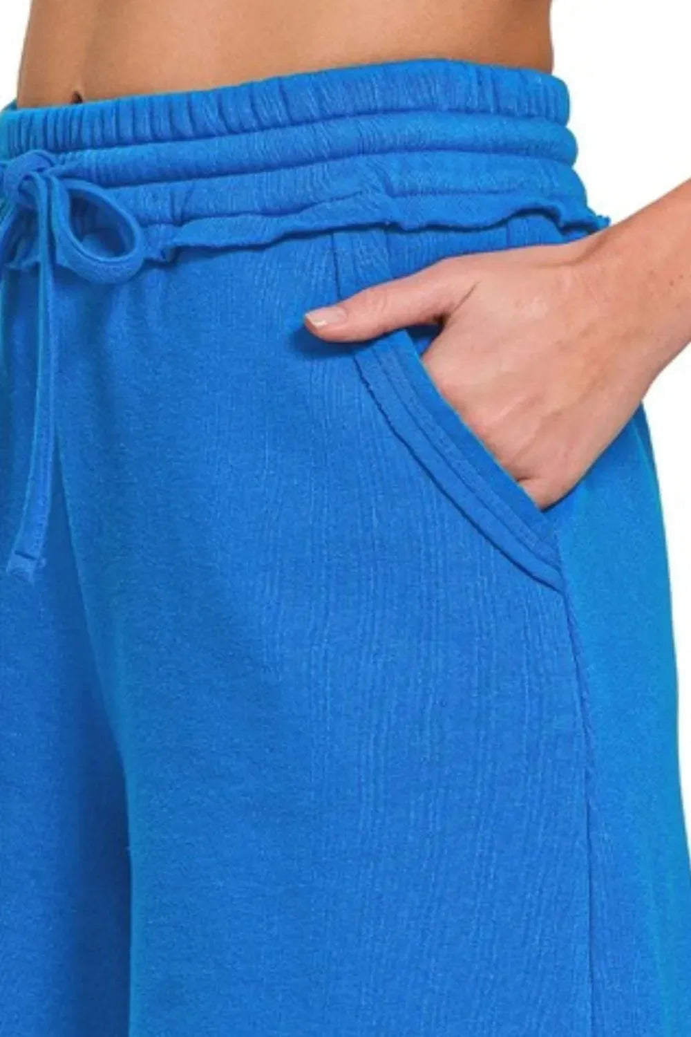 Ocean Blue Fleece Beach Shorts with Raw Hem women outfit ideas