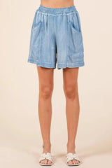 Washed Chambray Drawstring Beach Shorts in Light Denim women outfit ideas